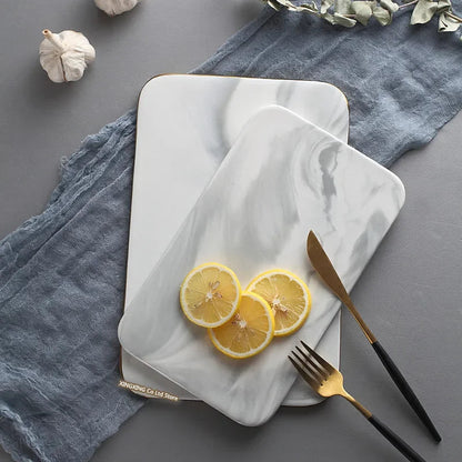 Planche à découper en marbre effet luxe – Finition dorée élégante